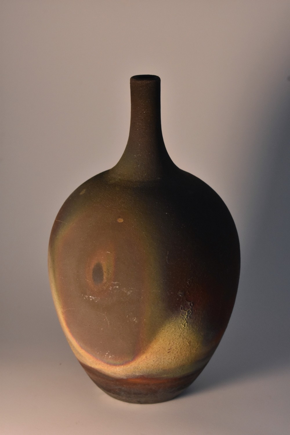 A Raku ware ovoid specimen vase, 14cm high,