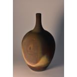 A Raku ware ovoid specimen vase, 14cm high,