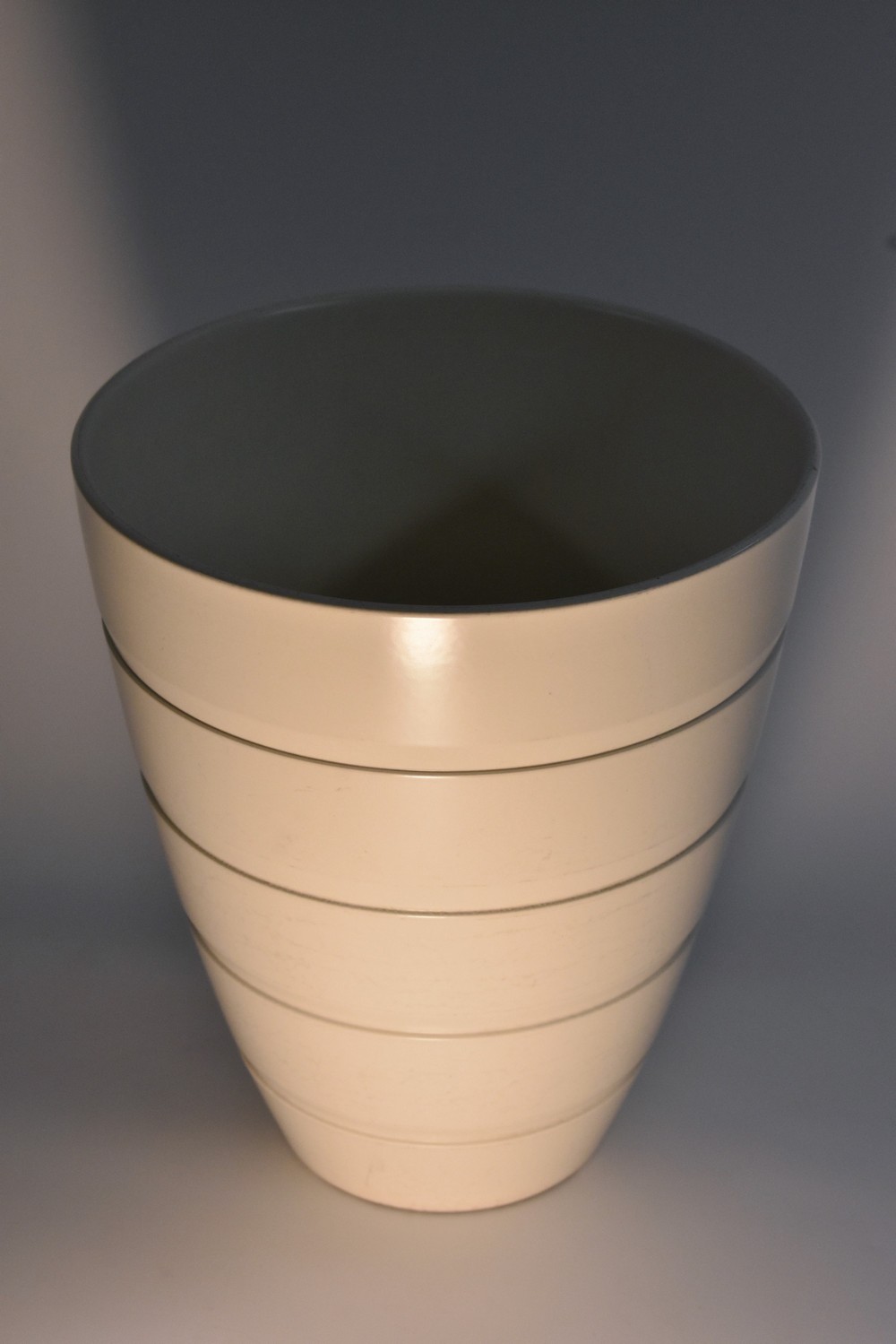 A Wedgewood Keith Murray ribbed tapering cylindrical vase, in the white, 23cm high, printed mark,