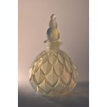 A Sabino opalescent glass scent bottle and stopper, moulded in relief with overlapping leaves,