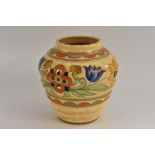 A Charlotte Rhead ribbed ovoid vase, painted and gilded with stylised flowers, printed mark,