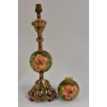 A Moorcroft and gilt metal mounted Hibiscus pattern table lamp, cast with flowers,