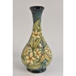 A contemporary Moorcroft Jasmine Carousel pattern bottle vase,