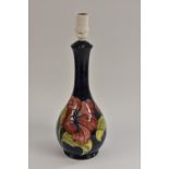 A Moorcroft Hibiscus pattern table lamp,