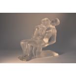 A Lalique frosted and clear glass figure, of a couple dancing naked, 15cm high, engraved mark,