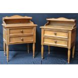 A pair of French style hardwood bedside cabinets