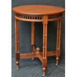 A Chippendale Revival walnut circular centre table, fretwork frieze, Gothic cluster-column legs, c.