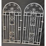 A pair of arched wrought iron garden gates 184cm high x 86cm wide