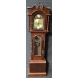 A reproduction grandmother clock, Tempus Fugit arched brass face, silvered chapter ring,