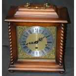 A mahogany cased bracket clock, brass dial, three chimes,