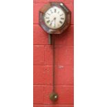 A Victorian rosewood and brass inlaid octagonal wall clock, c.