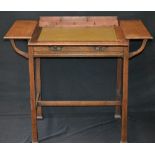 An Arts and Crafts oak writing desk, c.