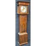A reproduction oak and pine longcase clock