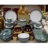 A Denby Pottery Regency Green part dinner and tea service comprising dinner plates, salad plates,