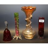 A late 19th century glass vase, a similar bud vase, a 1970's red glass vase,