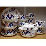 Ceramics - an Edwardian tea set, floral design on white ground, comprising cups, saucers,