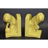 A pair of Bretby green glaze bookends,