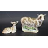 A Royal Crown Derby paperweight, Jacob Sheep, gold stopper, boxed; another, smaller, Jacob Lamb,