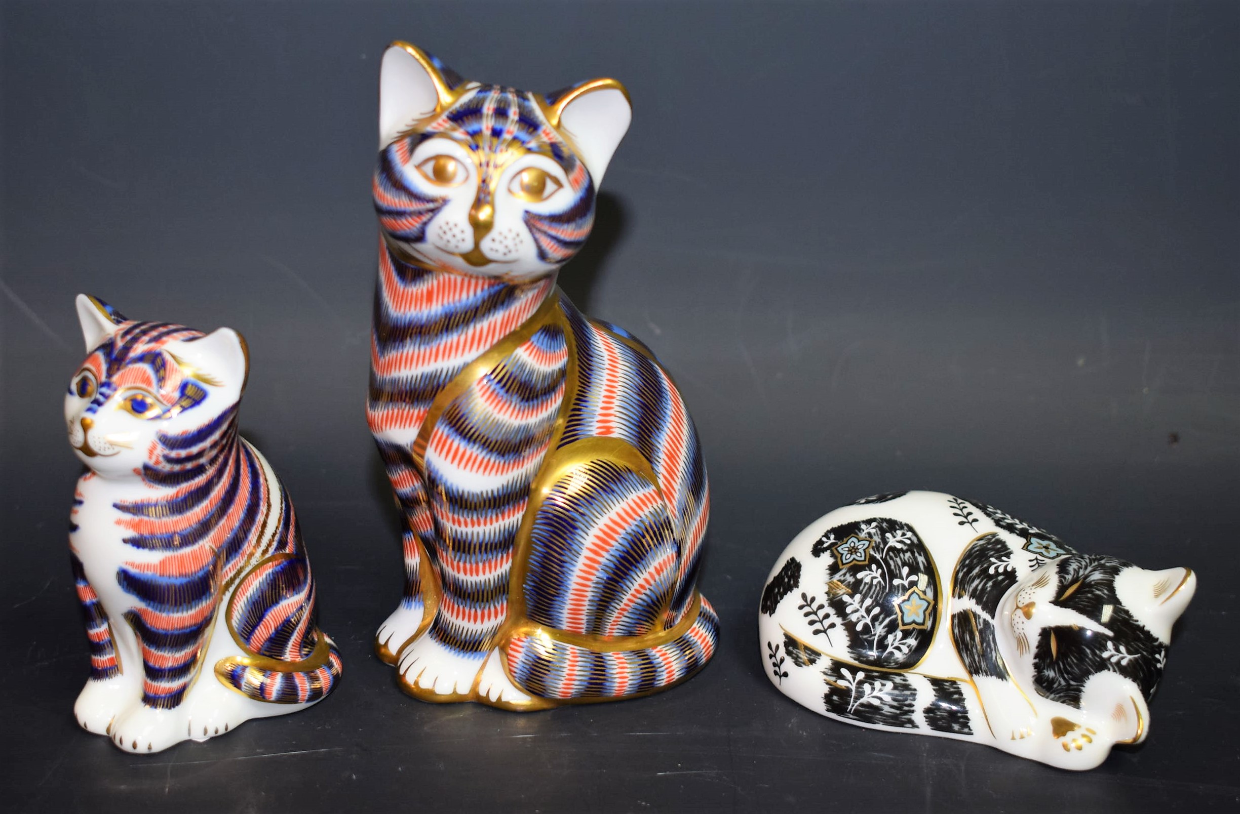 A Royal Crown Derby paperweight, Imari Cat, gold stopper; another, Imari Kitten, gold stopper,