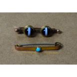 A 19th century banded agate two stone cabochon bar brooch, rose metal mount; another turquoise,