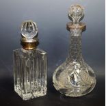 Glassware - a 19th century cut crystal glass decanter and stopper, with white metal rim; another,