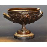 A 19th century French brown patinated bronze pedestal mantel urn,