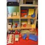 An Ikea two section dolls house with assorted furniture and accessories