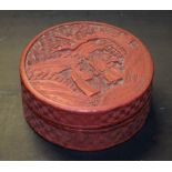 A Chinese cinnabar lacquer circular box and cover,