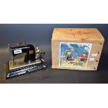 A child's Comet sewing machine, mid 20th century,