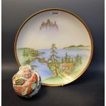 A Japanese Satsuma porcelaineous novelty, of a comic figure, painted in colourful polychrome,