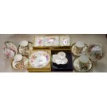 A set of four Royal Worcester coffee cups and saucers;