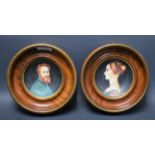 A hand painted porcelain plaque, Michelangelo; circular mahogany frame, another similar,