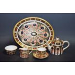 A Royal Crown Derby 1128 pattern miniature tea set on tray, coffee pot, cup and saucer,