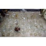 Glassware - a suite of engraved stemware, comprising Champagne, brandy, whisky; etc.