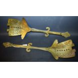 A pair of unusual 19th century brass armorial cream skimmers,