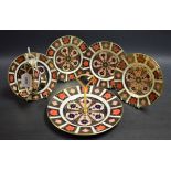 A set of three Royal Crown Derby 1128 Imari pattern side plates, 16cm diameter,