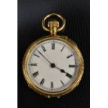 A lady's 18ct gold open face pocket watch, white enamel dial, bold Roman numerals, minute track,