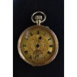 An Edwardian lady's open face fob watch, gilt floral dial, Roman numerals, minute track,