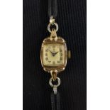 Tudor Rolex - a vintage lady's 9ct gold cased bracelet watch, cream cushion dial, Arabic numerals,