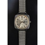 Omega - an automatic Geneve 1660 170 wristwatch, stepped stainless steel cushion case,