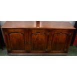 A Titchmarsh and Goodwin oak sideboard