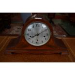 An Edwardian style inlaid mahogany Napoleon's hat mantel clock, silvered dial, Arabic numerals,