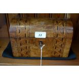 A Victorian walnut Tunbridge ware marquetry inlaid tea caddy, domed hinged cover,