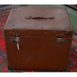 A travelling trunk, leather handle and corners, approx.