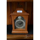 A Rotherham's mahogany mantel clock, silvered chapter ring, Roman numerals,