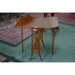 An Edwardian mahogany Sutherland table, crossbanded in satinwood,
