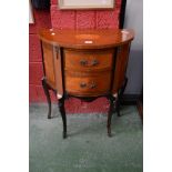 A marquetry demi-lune side table