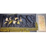 Textiles - a late Victorian silk over mantel panel with satin work embroidered lilies on black