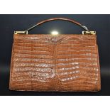 A crocodile handbag,