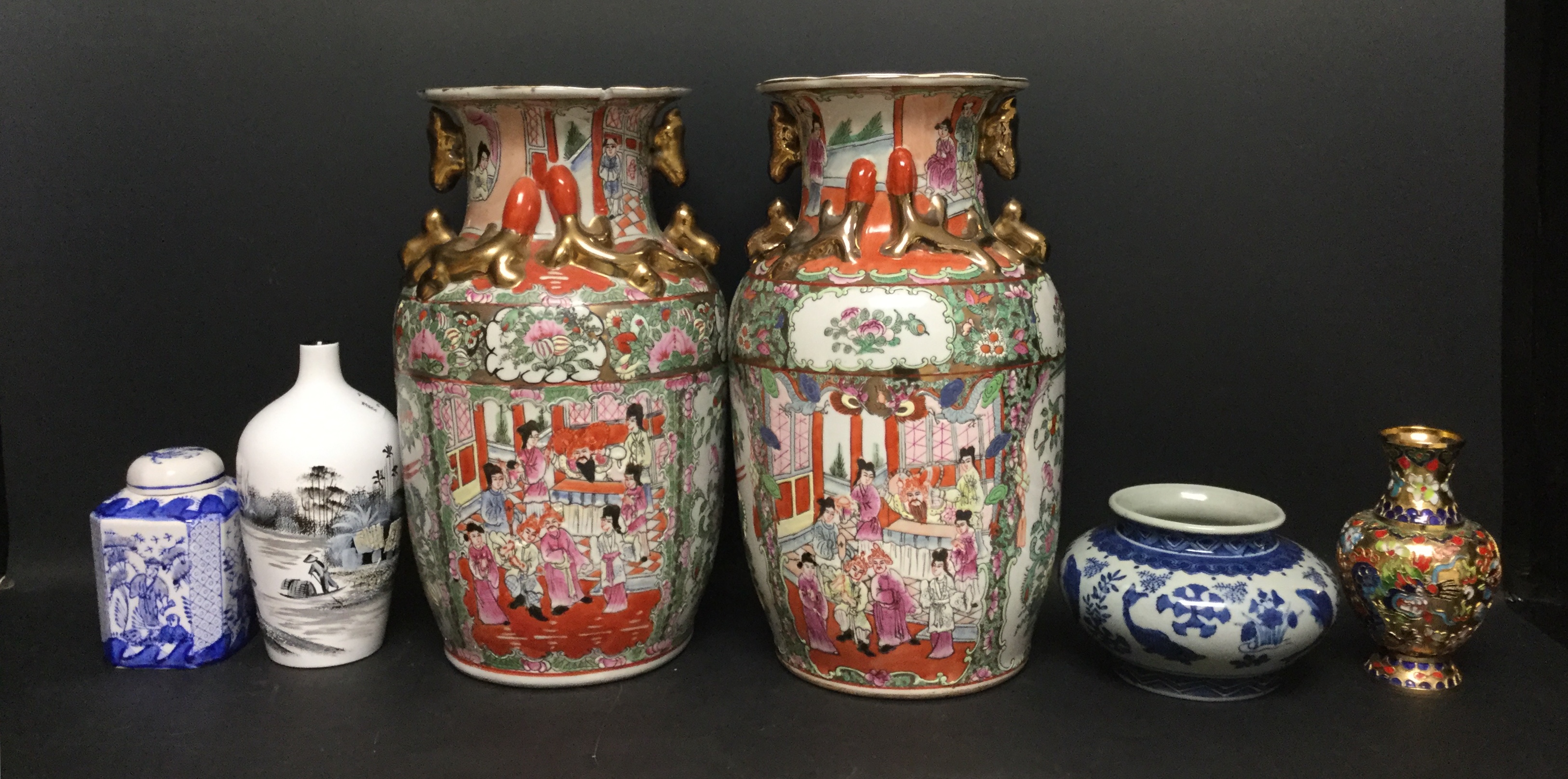 A pair of Chinese Kutani type Famille Rose vases; a painted black and white landscape vase;